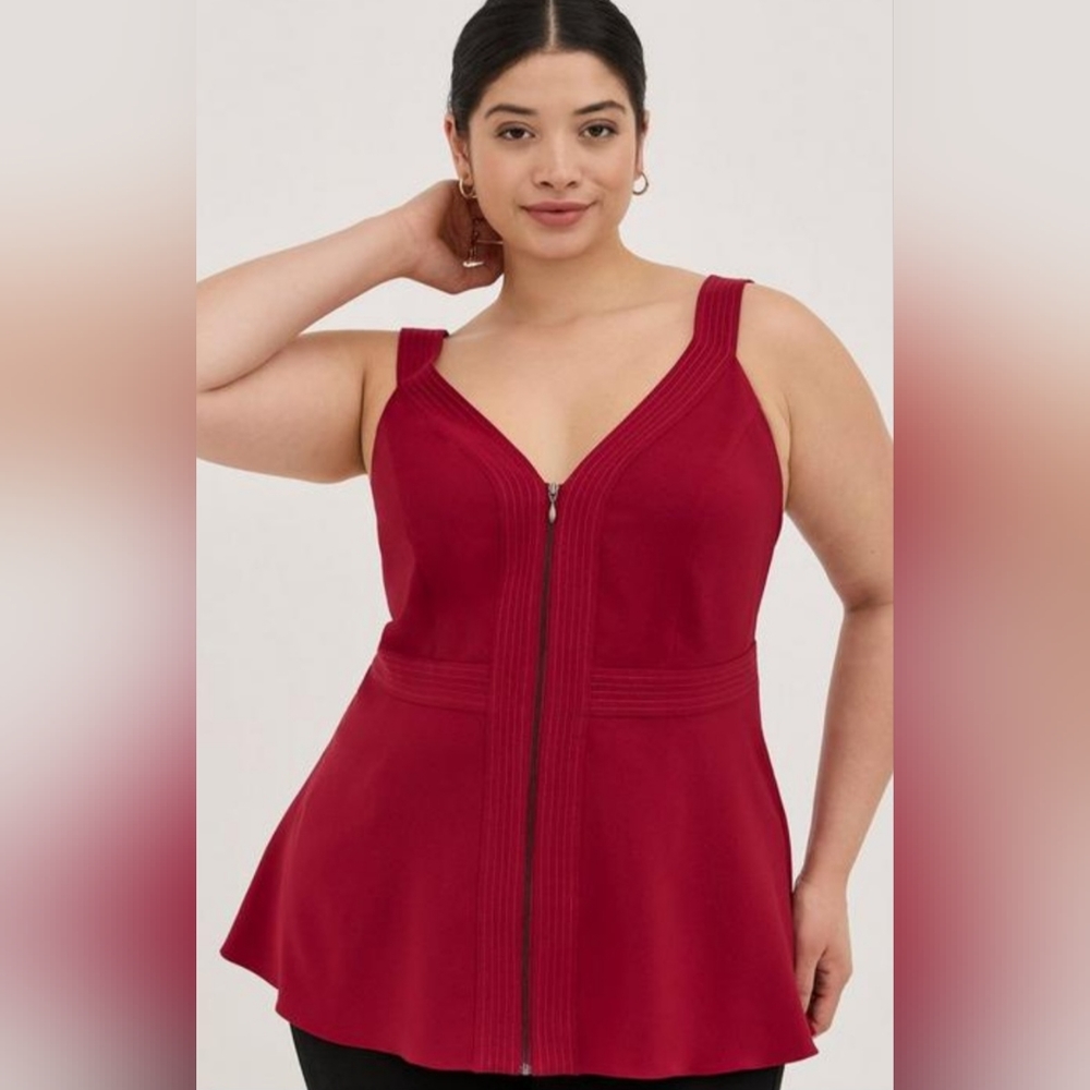 Torrid- New! Red zipper front peplum top. Never worn.